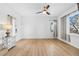 Bright living room with light wood floors at 13028 Grant W Cir # A, Thornton, CO 80241