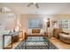 Comfortable living room features modern decor and hardwood floors at 1311 Carlyle Park Cir, Highlands Ranch, CO 80129