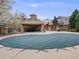 Community pool area with covered pool and adjacent pergola at 1311 Carlyle Park Cir, Highlands Ranch, CO 80129