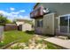 Cozy backyard featuring a storage shed, patio area, lush greenery, and a private fenced in space at 5154 E 126Th Ct, Thornton, CO 80241