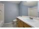 Bathroom with single sink vanity and a toilet at 5154 E 126Th Ct, Thornton, CO 80241