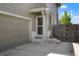 Inviting front entrance featuring a neutral door, brick accents, and well-maintained surroundings at 5154 E 126Th Ct, Thornton, CO 80241