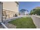 Charming backyard with a concrete patio and grill, perfect for outdoor dining and entertaining guests at 9523 Gray Ct, Westminster, CO 80031