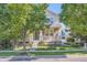 Inviting two-story home showcasing a well-kept front yard with trees at 9523 Gray Ct, Westminster, CO 80031
