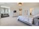 Large main bedroom featuring neutral color, furniture and decor, sitting area and ensuite bathroom at 9523 Gray Ct, Westminster, CO 80031
