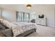 Bright main bedroom showcasing windows with blinds, neutral decor, furnishings and carpet at 9523 Gray Ct, Westminster, CO 80031