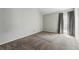 Cozy bedroom with neutral carpet, ample natural light, and modern trim at 9797 E Peakview Ave # C10, Englewood, CO 80111