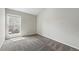Bedroom featuring neutral walls, carpet and natural light from a window at 9797 E Peakview Ave # C10, Englewood, CO 80111