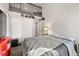 Bedroom features carpet, a bed with a grey comforter and a loft space at 9797 E Peakview Ave # C10, Englewood, CO 80111