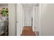 Hallway featuring wood flooring and a white ceiling at 9797 E Peakview Ave # C10, Englewood, CO 80111