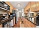 Well-equipped kitchen featuring dark countertops and plenty of cabinet storage space at 9797 E Peakview Ave # C10, Englewood, CO 80111