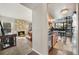 Inviting living room and kitchen featuring a cozy fireplace and an adjacent dining space at 9797 E Peakview Ave # C10, Englewood, CO 80111