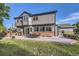 Charming backyard with a spacious patio, perfect for outdoor dining and entertaining at 12693 W 82Nd Ln, Arvada, CO 80005