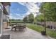 Backyard patio with outdoor seating area, perfect for enjoying the mountain views at 12693 W 82Nd Ln, Arvada, CO 80005