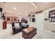 Finished basement area featuring a wet bar, entertainment area and a full bathroom at 12693 W 82Nd Ln, Arvada, CO 80005