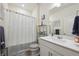 Clean, functional bathroom with a shower-tub combination, a stylish vanity, and neutral decor at 14670 Guernsey Dr, Mead, CO 80542