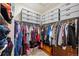 Spacious walk-in closet provides ample storage with shelving, drawers, and clothing racks at 14670 Guernsey Dr, Mead, CO 80542