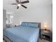 Comfortable bedroom includes a charming vanity area at 18093 E Milan Pl, Aurora, CO 80013
