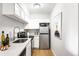 Charming kitchen featuring stainless steel appliances, sleek countertops, and ample storage at 4110 Hale Pkwy # 3K, Denver, CO 80220