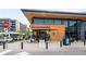 Exterior view of Culinary Dropout with outdoor seating and curbside pickup signage at 4110 Hale Pkwy # 3K, Denver, CO 80220