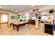 Recreational basement features a pool table, bar and living area for relaxation and entertainment at 1820 Sapling Ct, Castle Rock, CO 80109