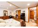 Spacious basement bedroom with ample closet space, adjacent to attached bathroom at 1820 Sapling Ct, Castle Rock, CO 80109