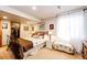 Basement bedroom with a cozy bed, closet, and a window for natural light at 1820 Sapling Ct, Castle Rock, CO 80109
