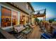 A spacious deck with outdoor seating offers a picturesque view of the mountains and surrounding scenery at 1820 Sapling Ct, Castle Rock, CO 80109