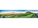 Beautiful panoramic view showcasing the lush golf course and the scenic neighborhood, perfect for enjoying outdoor serenity at 1820 Sapling Ct, Castle Rock, CO 80109