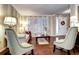 Living room with hardwood floors, neutral walls, and a fireplace at 10697 W Roxbury Ave, Littleton, CO 80127