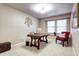 Home office with built-in window seat and wood desk at 10697 W Roxbury Ave, Littleton, CO 80127