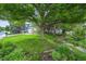 Charming front yard with mature trees and lush green lawn at 1190 W 11Th Ct, Broomfield, CO 80020