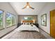 Bright and spacious main bedroom suite features large windows and ensuite bathroom at 1190 W 11Th Ct, Broomfield, CO 80020