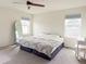 Bedroom with carpet, mirror, desk and chair at 8951 E 59Th Pl, Denver, CO 80238