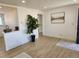 Spacious living room with hardwood floors and neutral décor, offering a versatile living space at 7956 Joan Dr, Denver, CO 80221