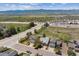 Aerial view of homes with mountain views and convenient highway access at 3787 Bucknell Dr, Highlands Ranch, CO 80129