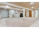 Large finished basement with a ceiling pattern and lighting throughout the room at 3787 Bucknell Dr, Highlands Ranch, CO 80129