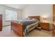 Comfortable bedroom with natural light, wood floors, and closet at 3787 Bucknell Dr, Highlands Ranch, CO 80129
