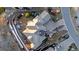 Aerial view of an expansive property showcasing architectural design and landscaping at 5810 Amber Ridge Dr, Castle Pines, CO 80108