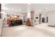 Spacious basement with bar, stone details, and game area, perfect for entertaining at 5810 Amber Ridge Dr, Castle Pines, CO 80108