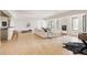 Large open basement featuring a fireplace, built in bar, and recreation area at 8937 Little Raven Trl, Niwot, CO 80503