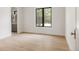 Bright bedroom with light wood floors and an ensuite bathroom at 8937 Little Raven Trl, Niwot, CO 80503