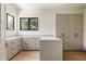 Organized closet featuring custom cabinetry, ample storage, and natural light at 8937 Little Raven Trl, Niwot, CO 80503