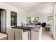 Open concept floor plan featuring dining area with large table and chairs that flow into the living space at 8937 Little Raven Trl, Niwot, CO 80503