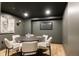 Well-lit game room with a large table and comfortable chairs, offering a cozy space for entertainment at 8937 Little Raven Trl, Niwot, CO 80503