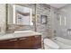 Stylish bathroom features modern vanity, sleek fixtures, and tile shower over tub at 11409 Jay St, Westminster, CO 80020