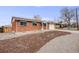 Picture of the home exterior with a red brick exterior and well maintained landscaping at 8331 Mason Cir, Westminster, CO 80031