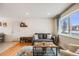 Inviting living room with ample natural light and stylish furnishings at 8331 Mason Cir, Westminster, CO 80031