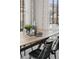 Cozy dining space features a modern table setting, natural light, and elegant decor at 2668 Scoter Ln, Castle Rock, CO 80104