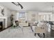 Bright living room featuring neutral tones, plush seating, and modern decor at 2668 Scoter Ln, Castle Rock, CO 80104